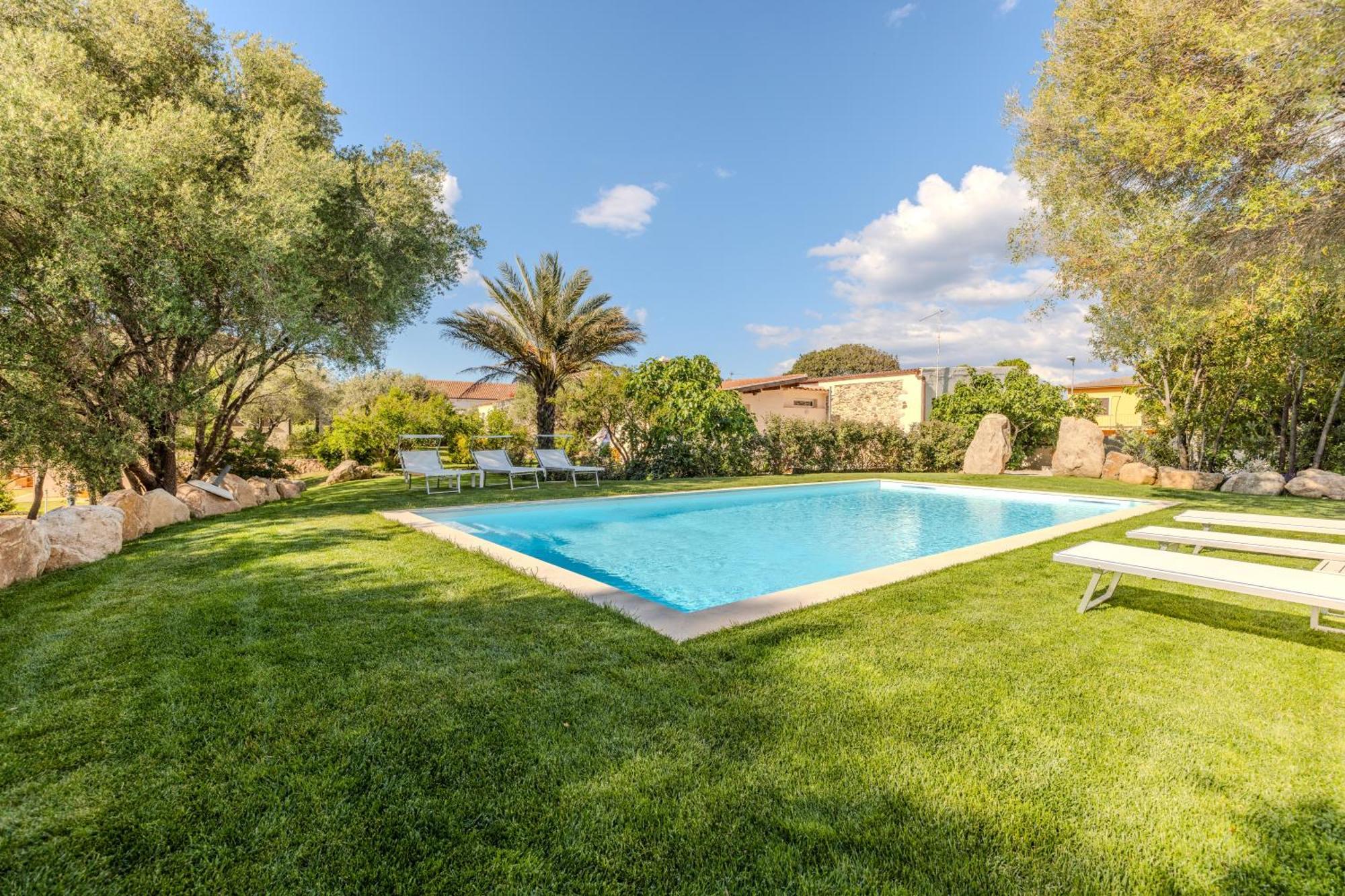 Appartement Stazzo San Teodoro La Quercia Piscina Condivisa Extérieur photo