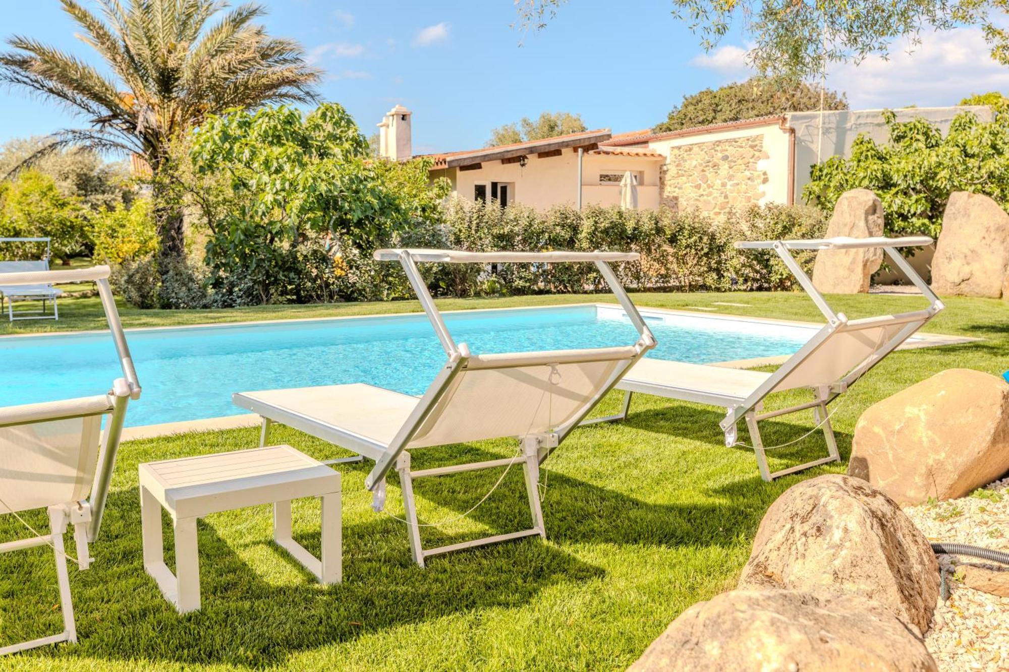 Appartement Stazzo San Teodoro La Quercia Piscina Condivisa Extérieur photo
